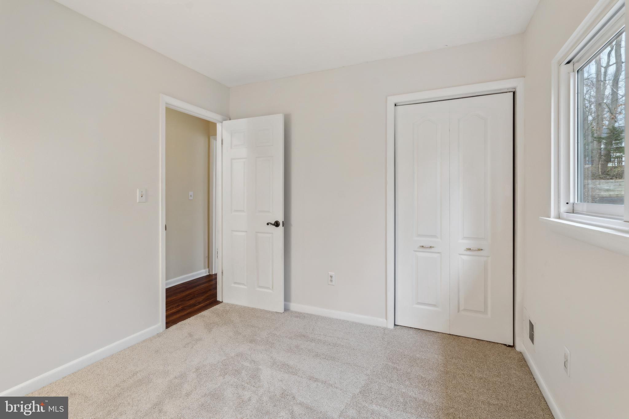 698 Benfield Road Severna Park, MD 21146 - Photo 13 of 28 an empty room with windows and closet