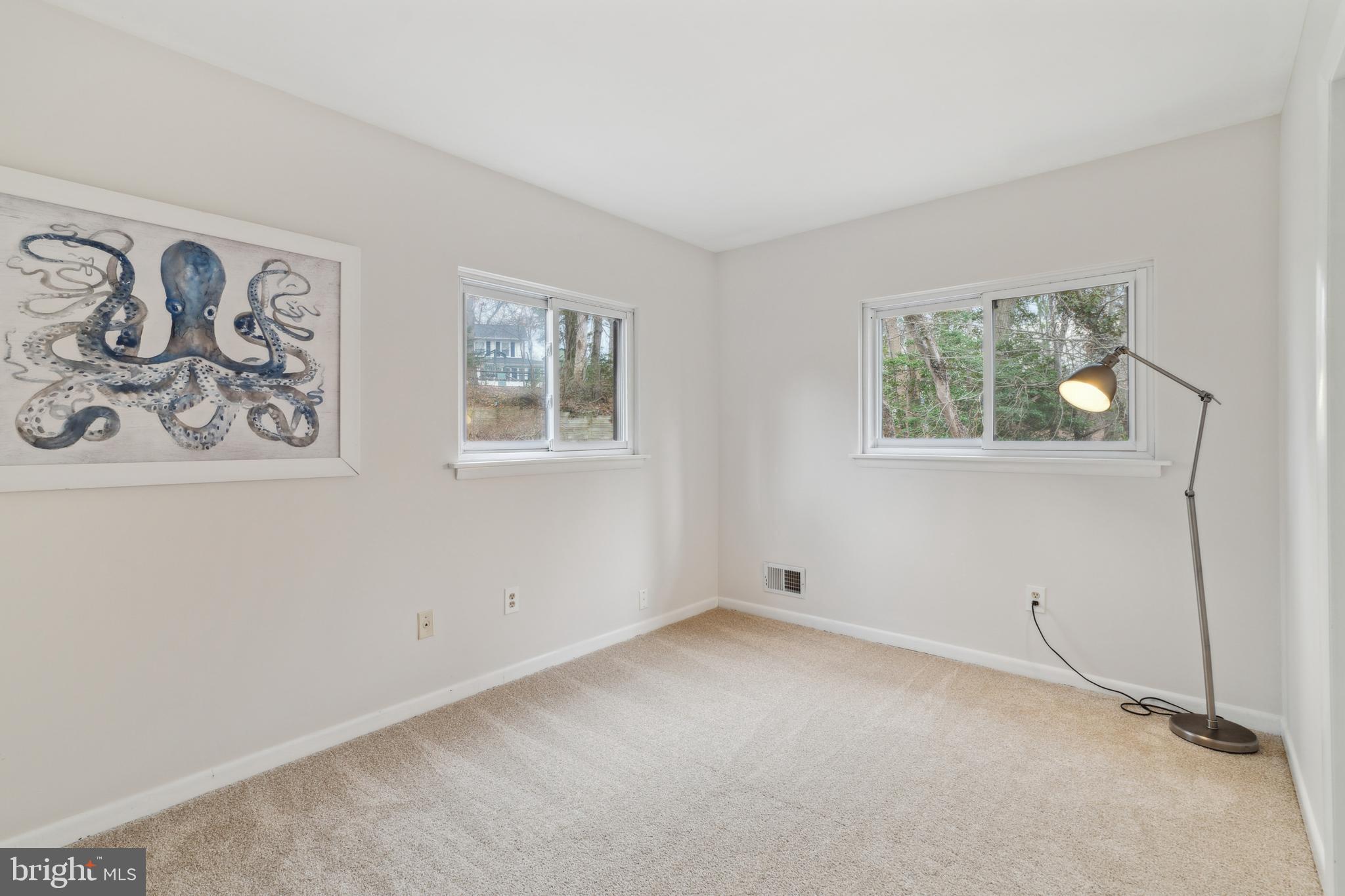 698 Benfield Road Severna Park, MD 21146 - Photo 16 of 28 a view of room with window and wooden floor