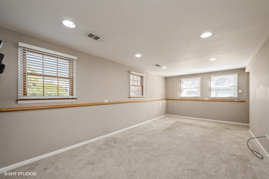 3208 Wren Lane Rolling Meadows, IL 60008 - Photo 15 of 18 a view of an empty room with a window