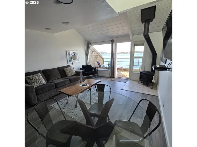 a living room with furniture and a table