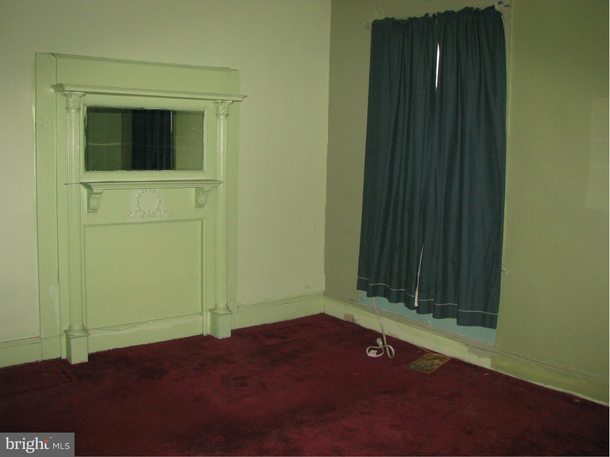 598 Park Road Northwest Washington, DC 20010 - Photo 14 of 23 Master Bedroom Fireplace