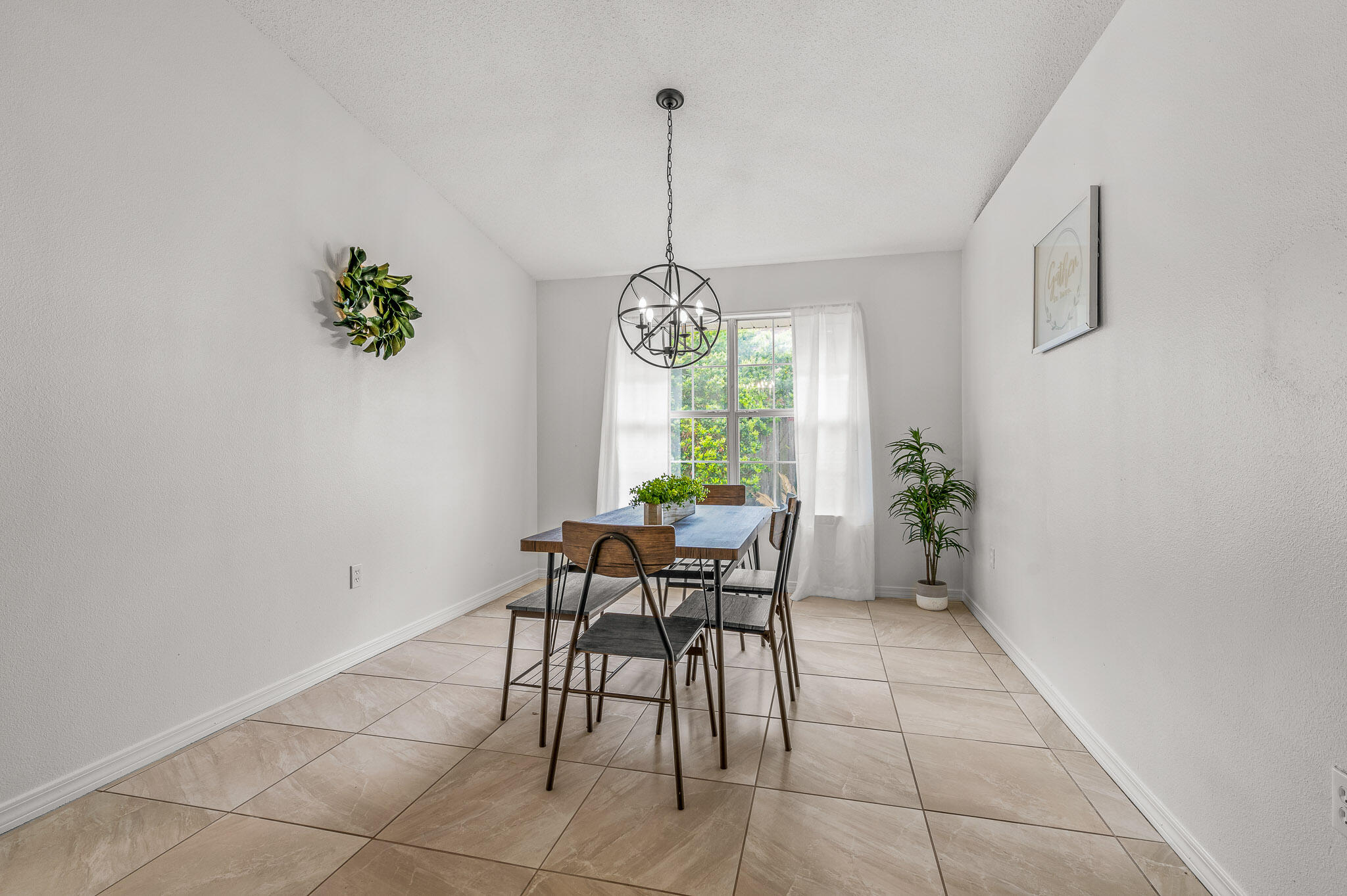 5186 Whitehurst Lane Crestview, FL 32536 - Photo 11 of 55 a dining room with furniture and window