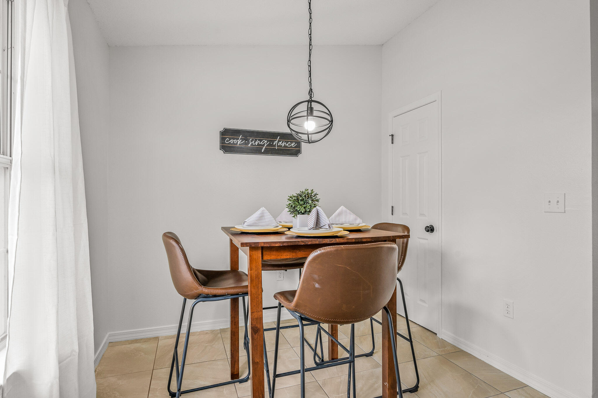 5186 Whitehurst Lane Crestview, FL 32536 - Photo 20 of 55 a view of a workspace with furniture and wooden floor
