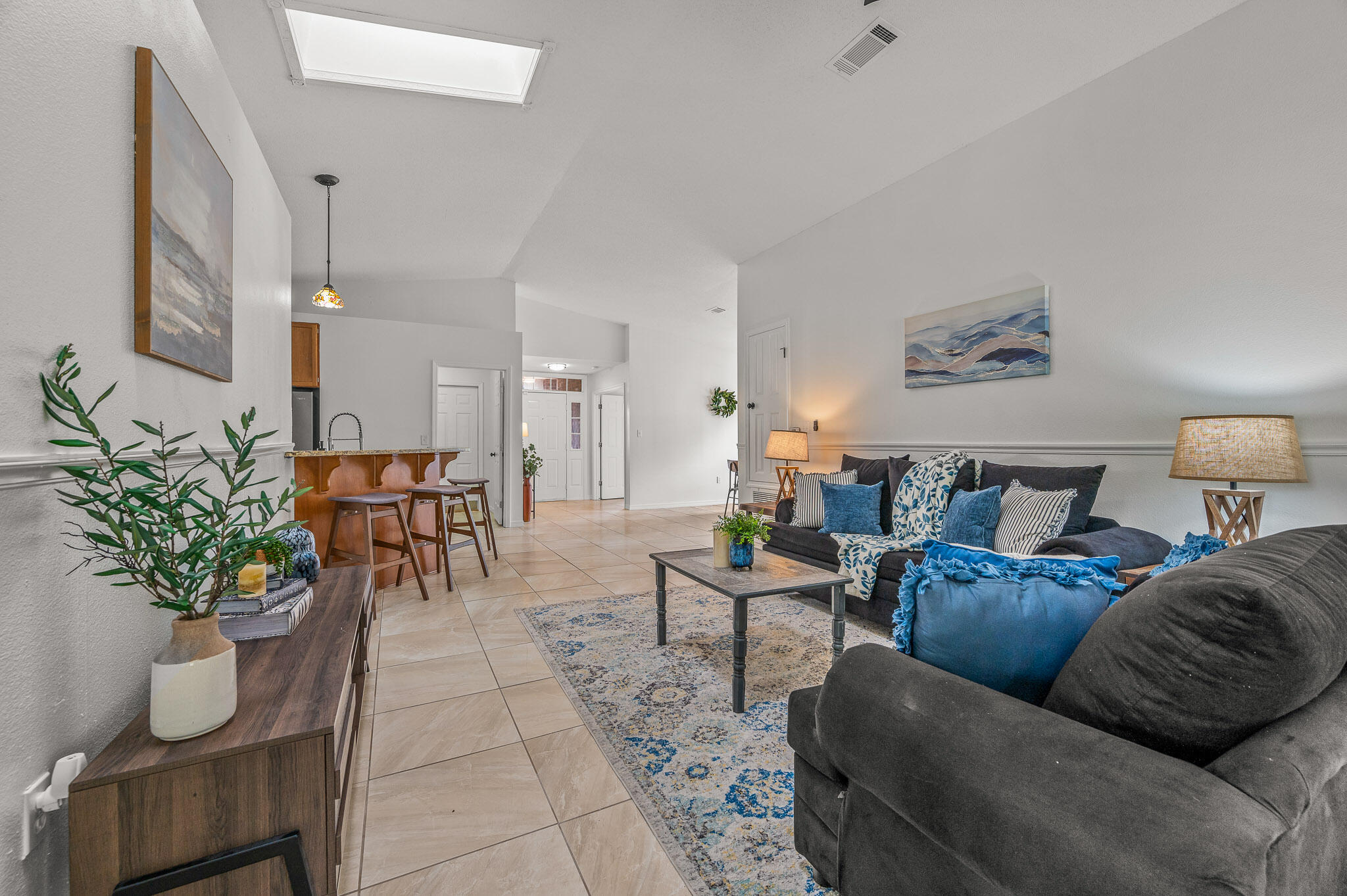 5186 Whitehurst Lane Crestview, FL 32536 - Photo 29 of 55 a living room with furniture flowerpot and a chandelier