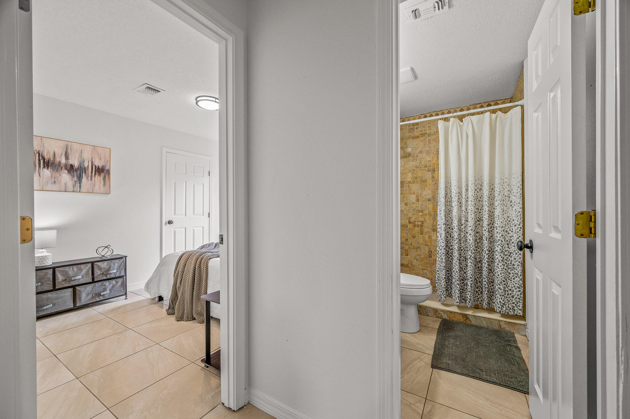 5186 Whitehurst Lane Crestview, FL 32536 - Photo 32 of 55 a view of a hallway with closet and bathroom