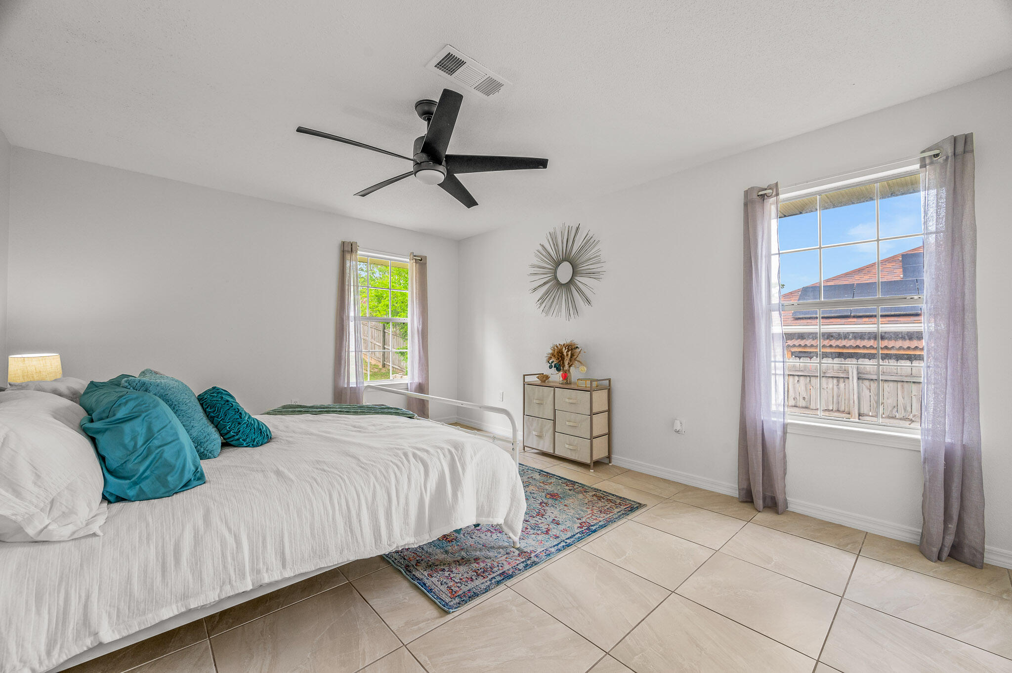 5186 Whitehurst Lane Crestview, FL 32536 - Photo 45 of 55 a bedroom with a bed and a window