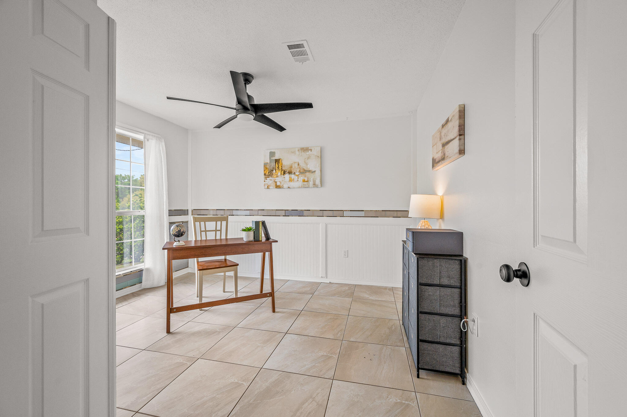 5186 Whitehurst Lane Crestview, FL 32536 - Photo 7 of 55 a view of kitchen with furniture and wooden floor