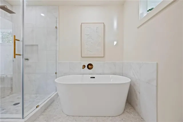 a view of a bathtub in a bathroom