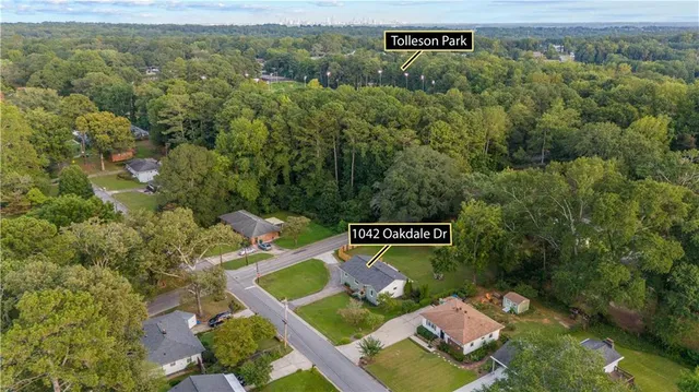 an aerial view of a house with swimming pool
