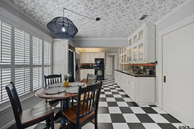 a view of a dining room with furniture