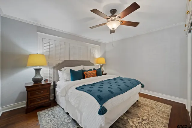 a bed room with a bed and a lamp