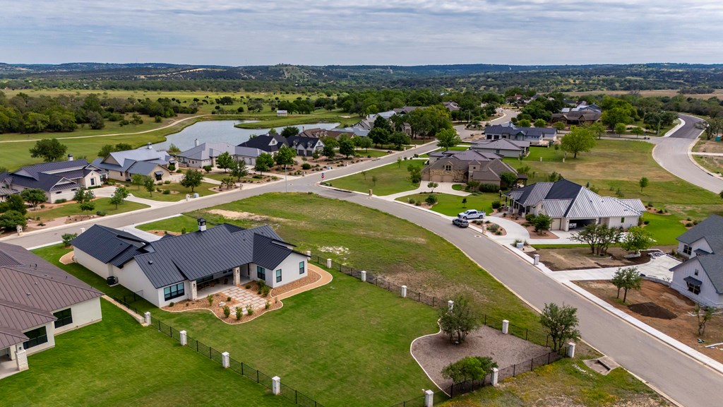 1024 Pinnacle View Drive Kerrville, TX 78028 - Photo 9 of 19 an aerial view of a house with a garden and lake view
