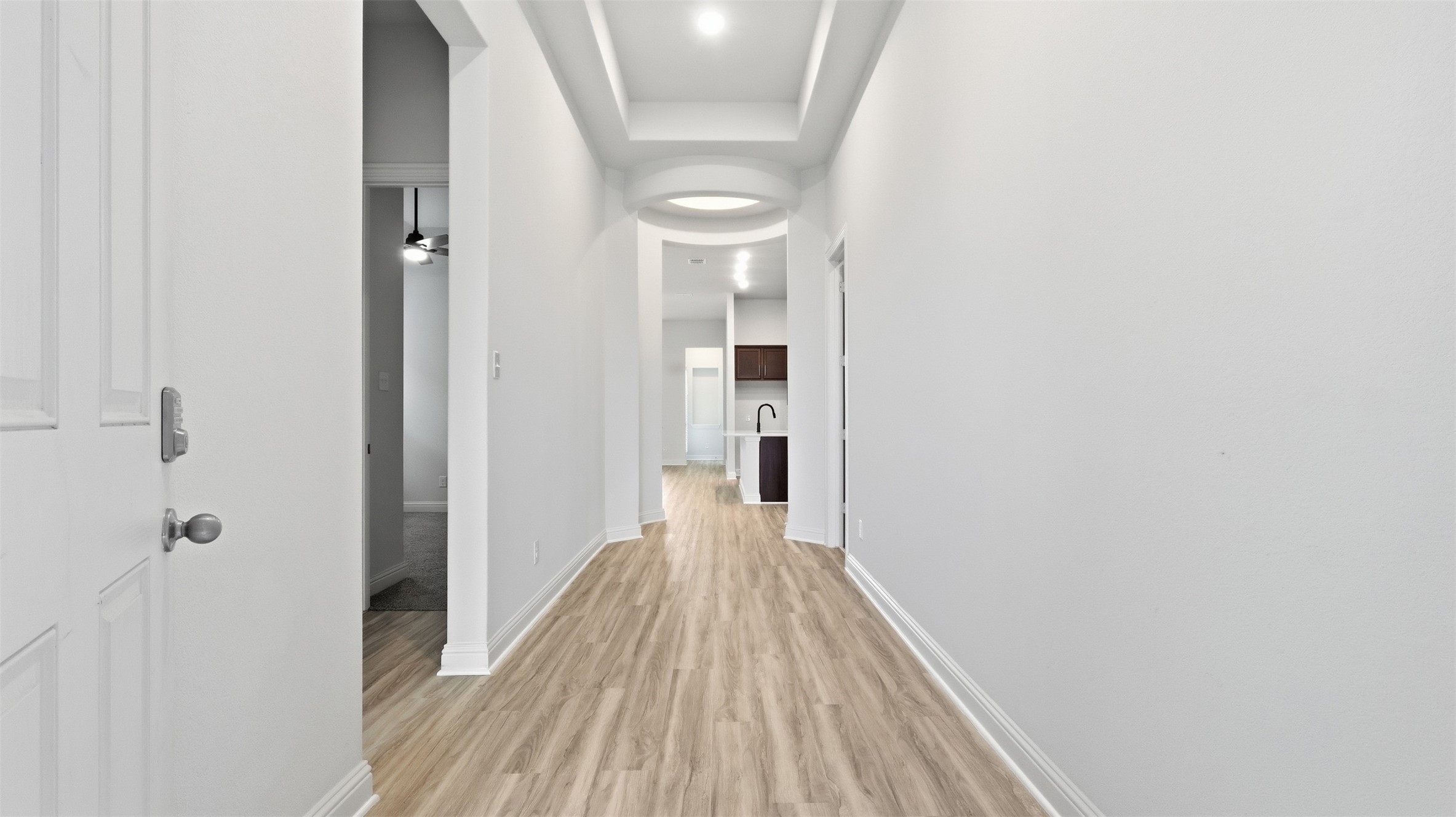 3006 Myrtle Bch Lane League City, TX 77573 - Photo 6 of 21 a view of a hallway with wooden floor