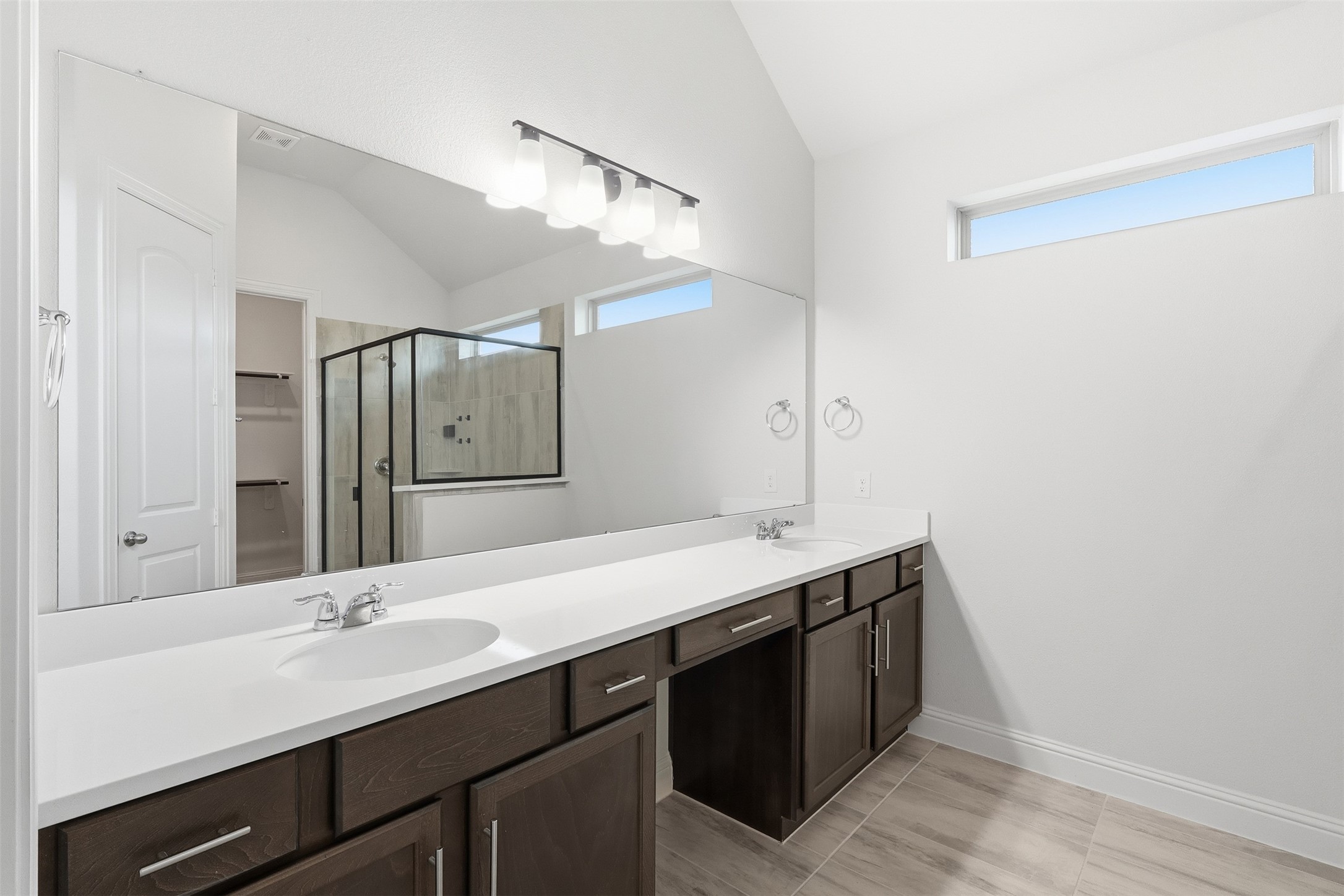 3006 Myrtle Bch Lane League City, TX 77573 - Photo 8 of 21 a bathroom with a double vanity sink and a mirror