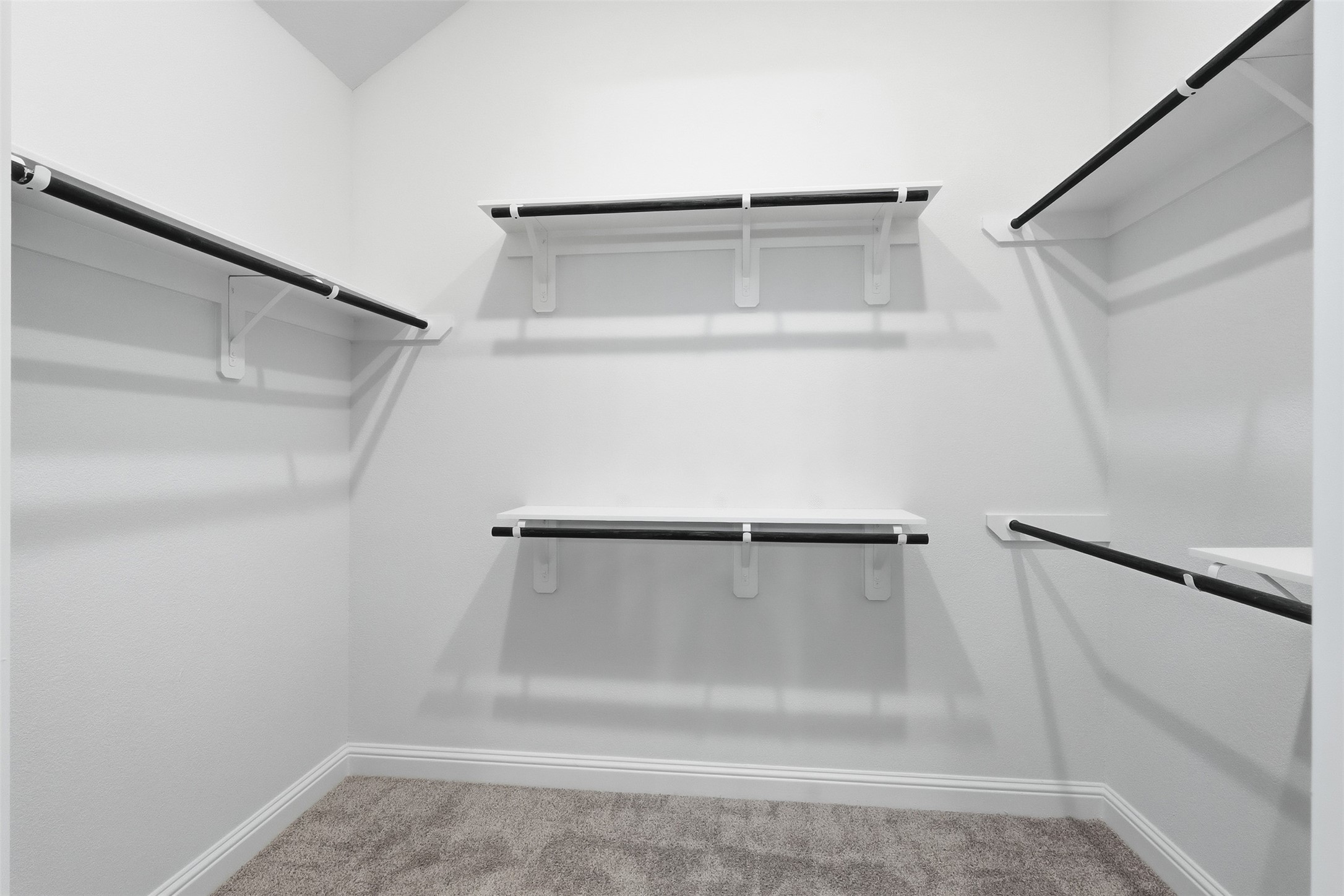 3006 Myrtle Bch Lane League City, TX 77573 - Photo 10 of 21 a view of walk in closet with empty racks