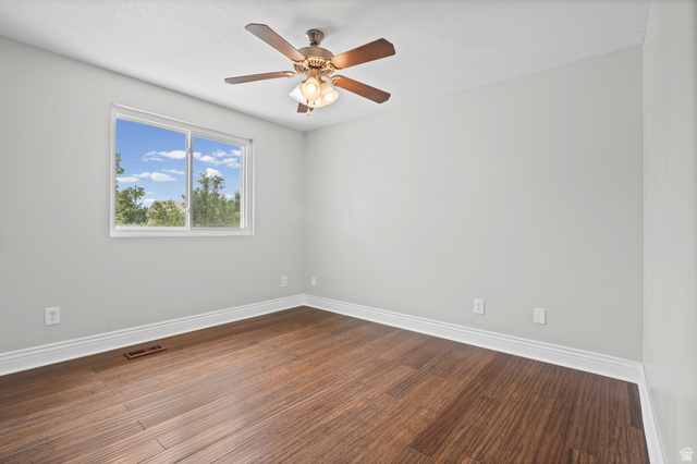 1346 Archmore Drive Springville, UT 84663 - Photo 11 of 32 Room featuring wood-finish flooring, white baseboards, and light gray walls