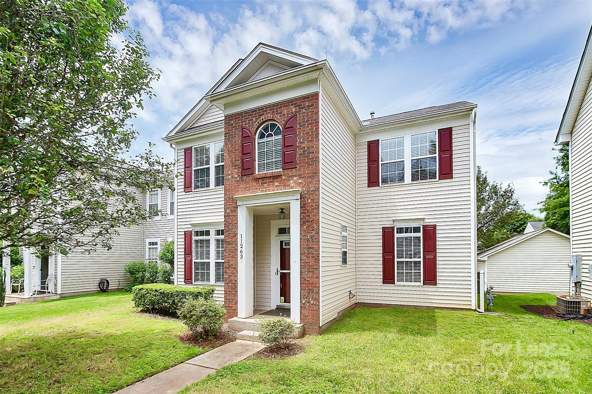 a front view of house with yard