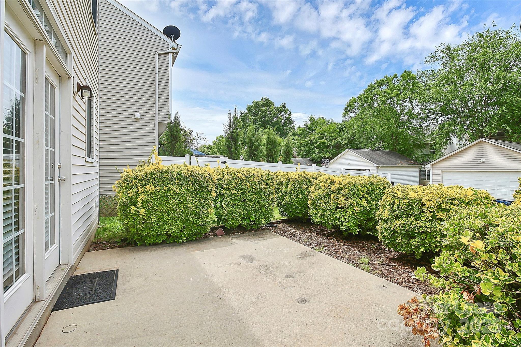 11263 Heritage Green Drive Cornelius, NC 28031 - Photo 30 of 32 a view of a garden with plants
