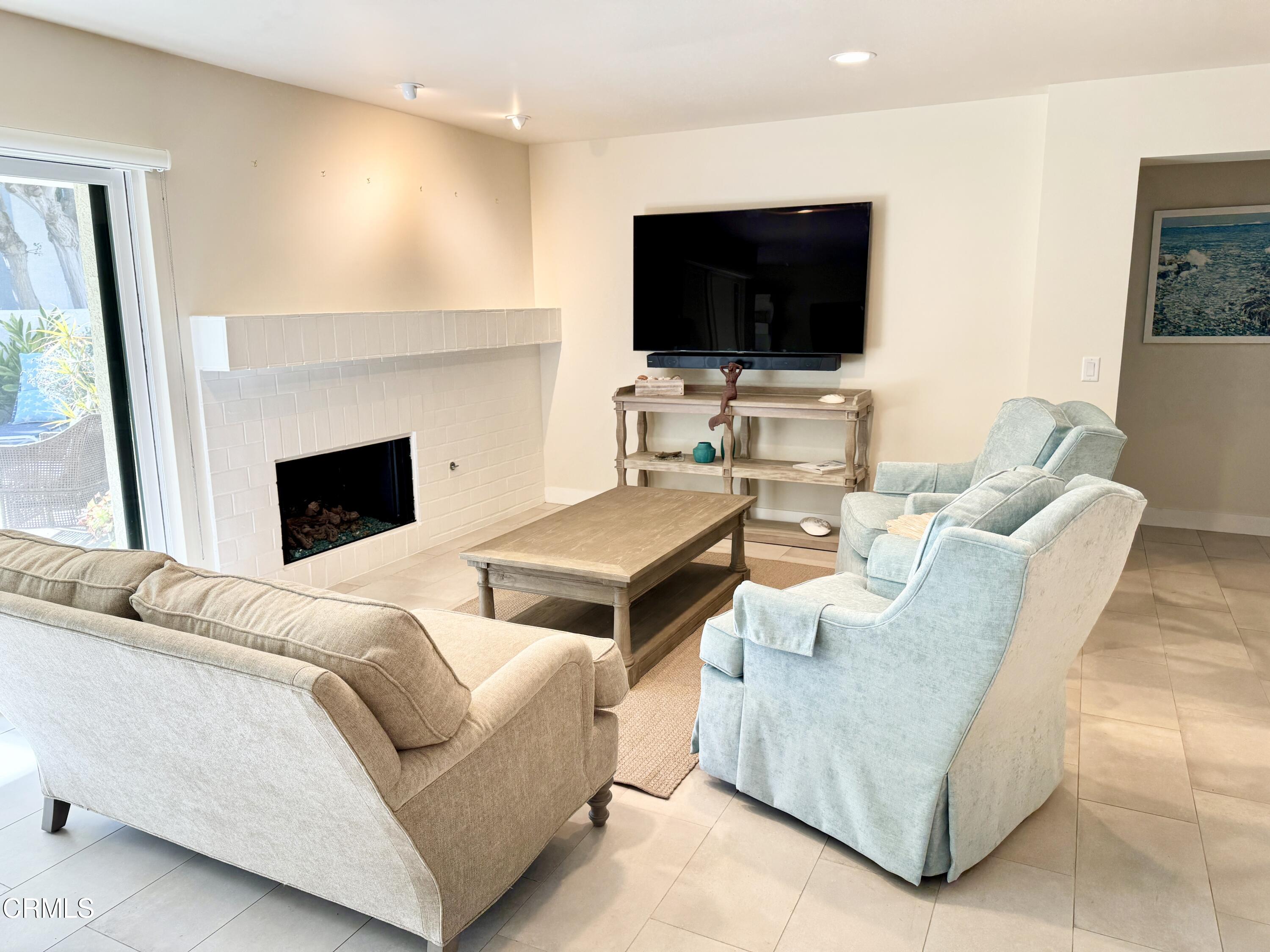 1915 Majorca Drive Oxnard, CA 93035 - Photo 12 of 29 a living room with furniture and a flat screen tv