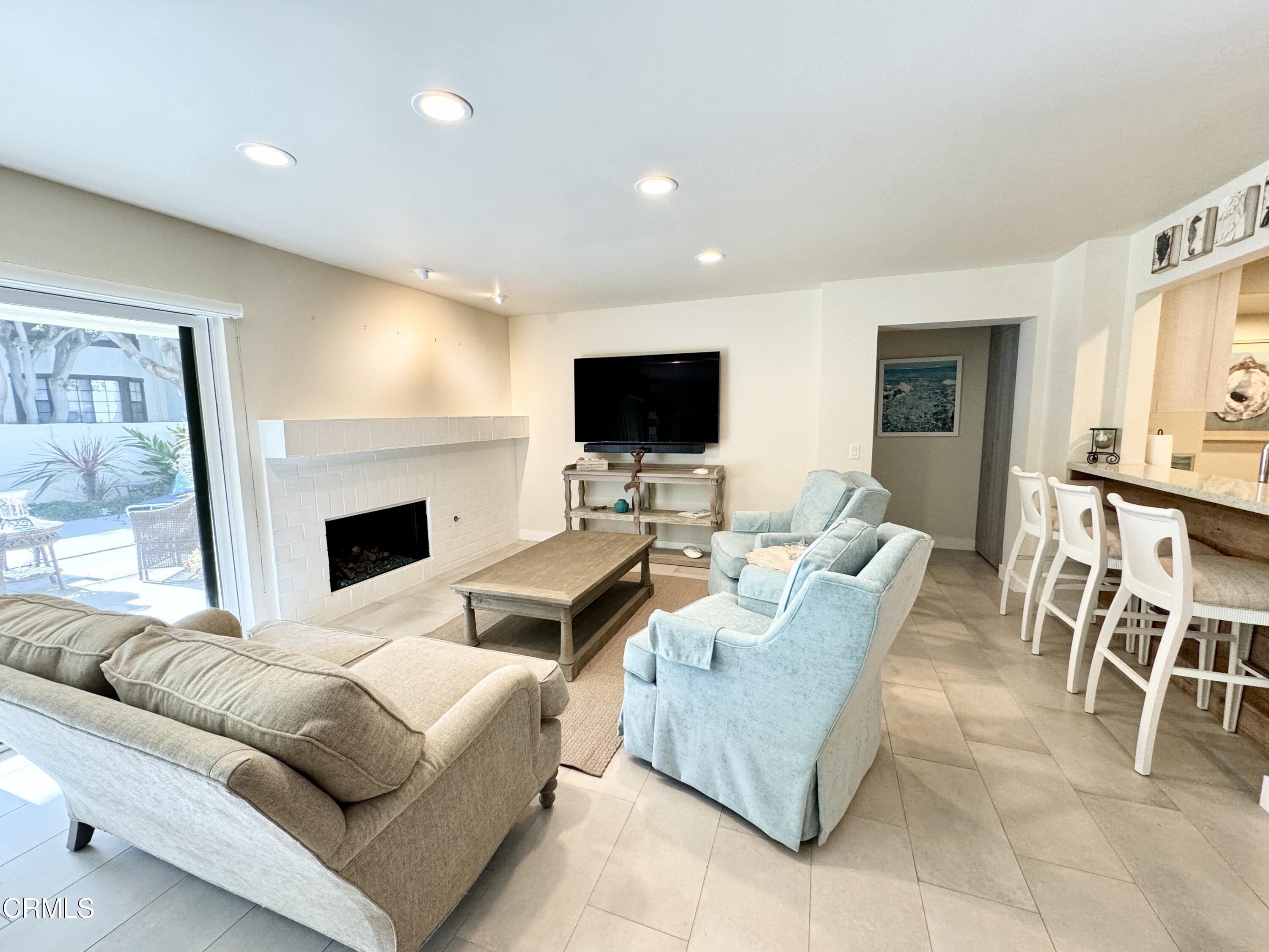 1915 Majorca Drive Oxnard, CA 93035 - Photo 13 of 29 a living room with furniture and a fireplace