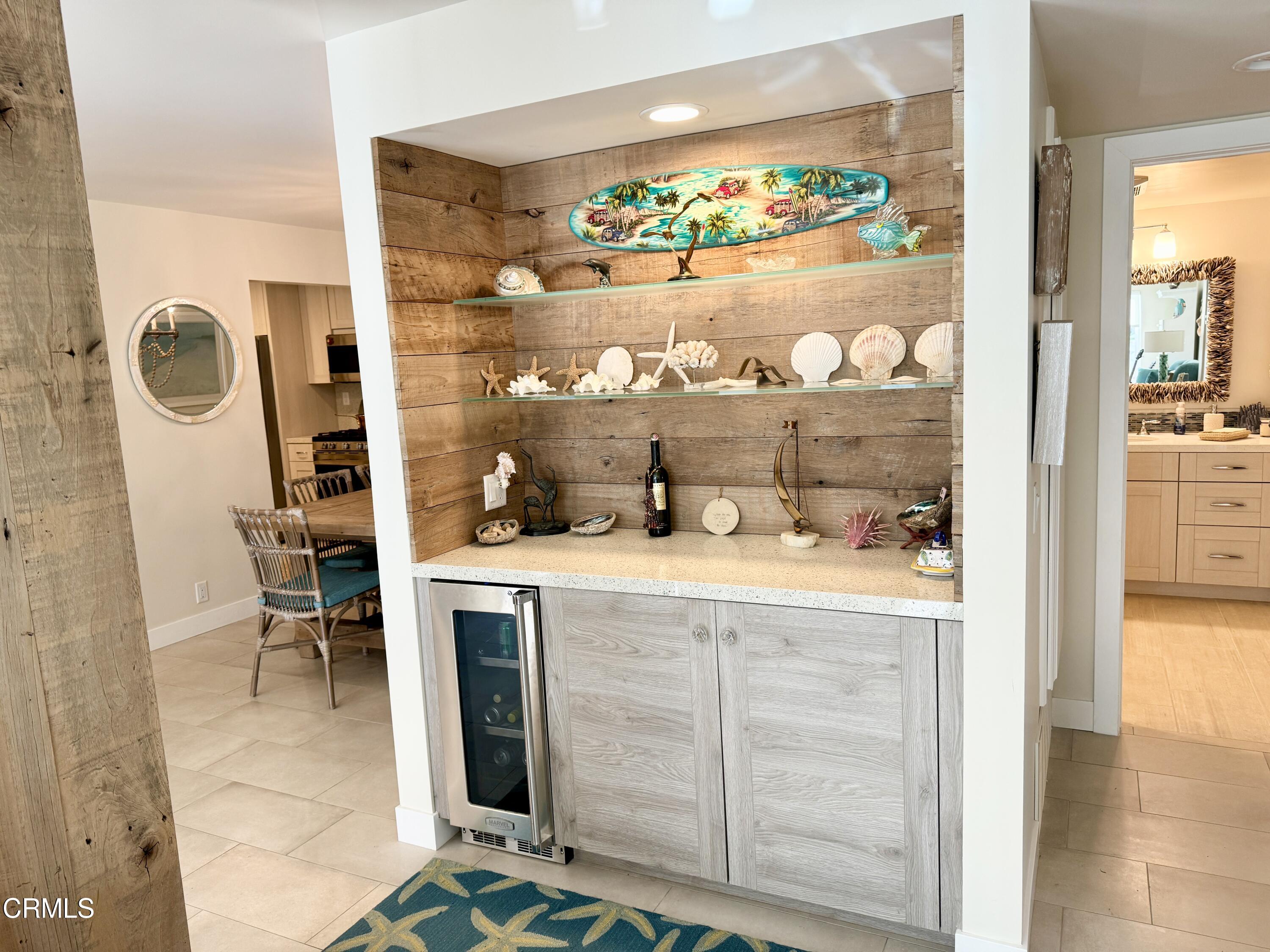 1915 Majorca Drive Oxnard, CA 93035 - Photo 8 of 29 a kitchen with a stove and a painting on the wall