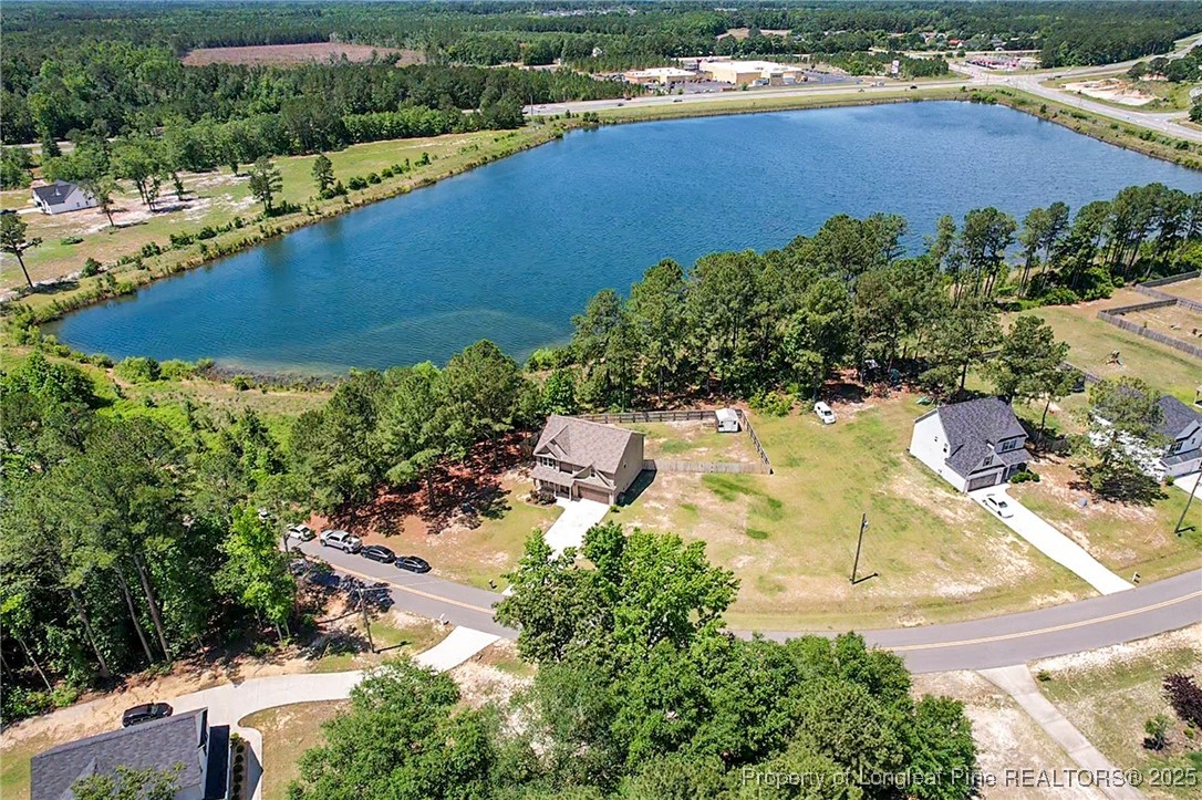 405 Shelton Beard Road Stedman, NC 28391 - Photo 2 of 36 an aerial view of a house with a lake view