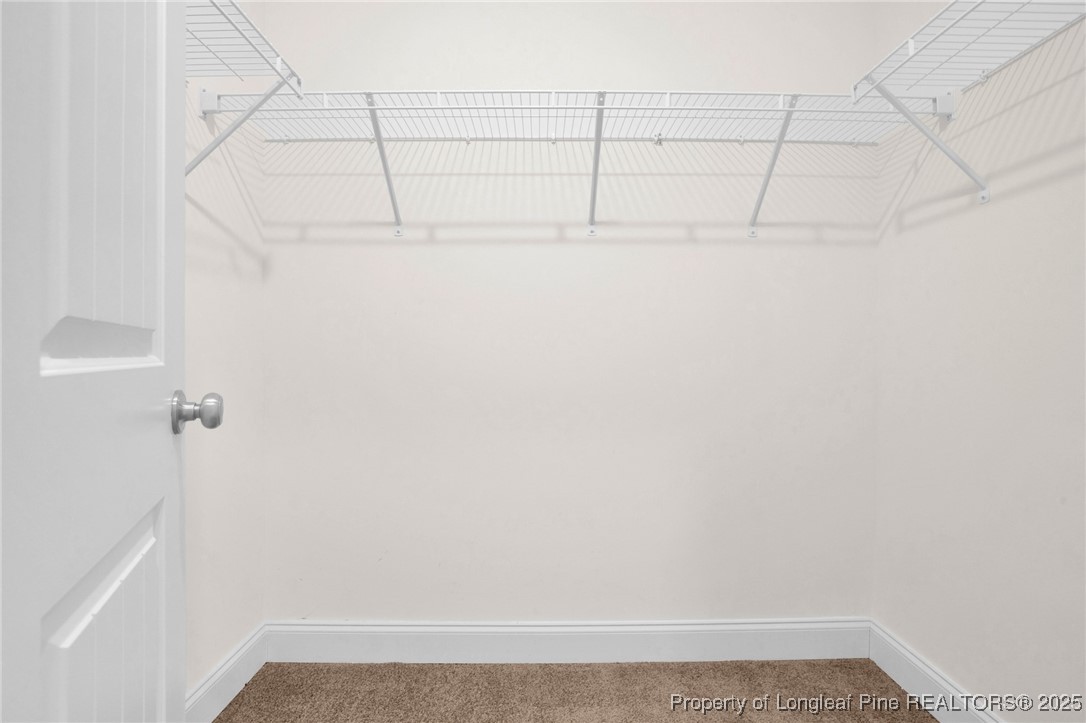 405 Shelton Beard Road Stedman, NC 28391 - Photo 26 of 36 a view of small space with empty racks