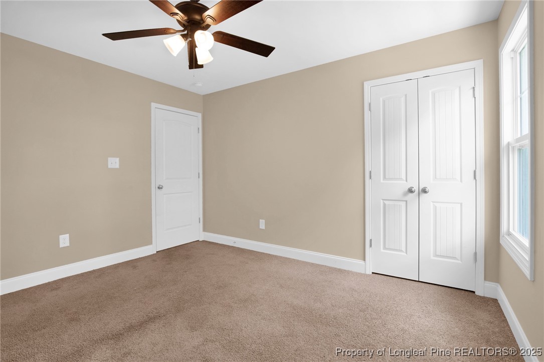 405 Shelton Beard Road Stedman, NC 28391 - Photo 29 of 36 a view of an empty room with a window