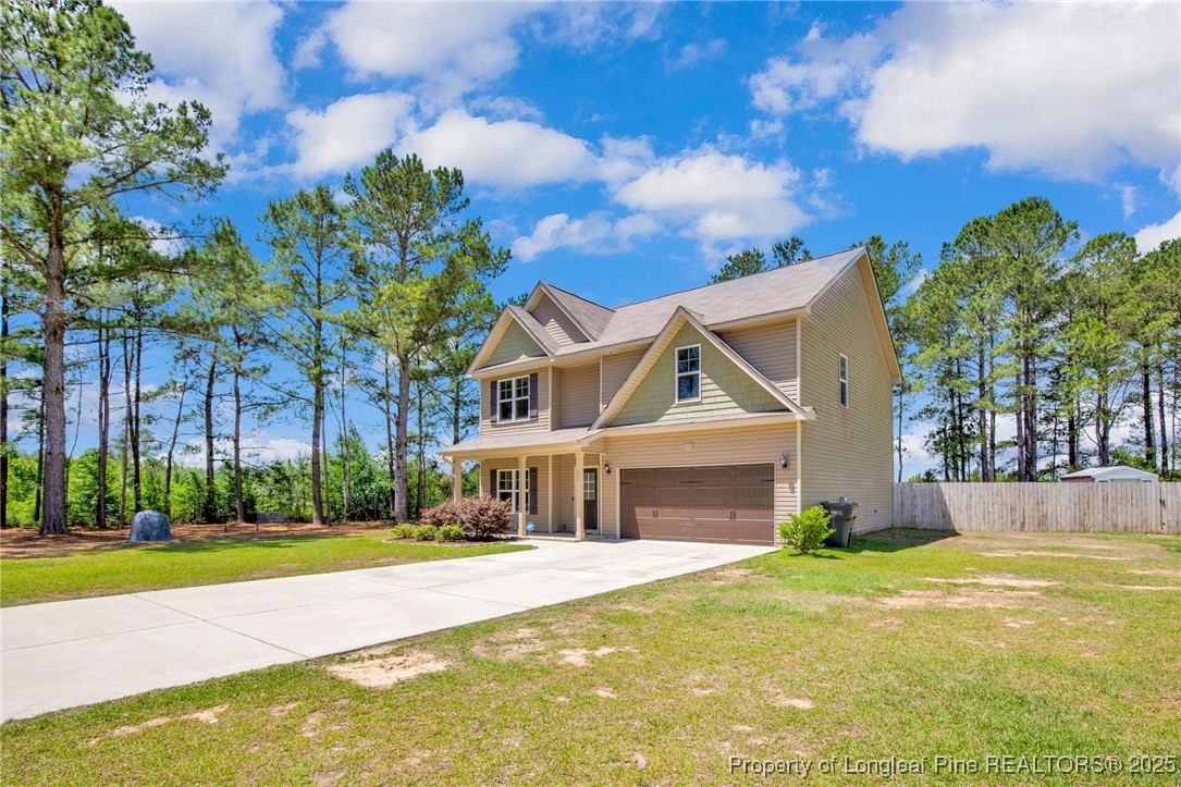 405 Shelton Beard Road Stedman, NC 28391 - Photo 6 of 36 a front view of house with yard and green space
