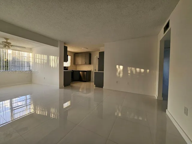 a view of a livingroom with furniture