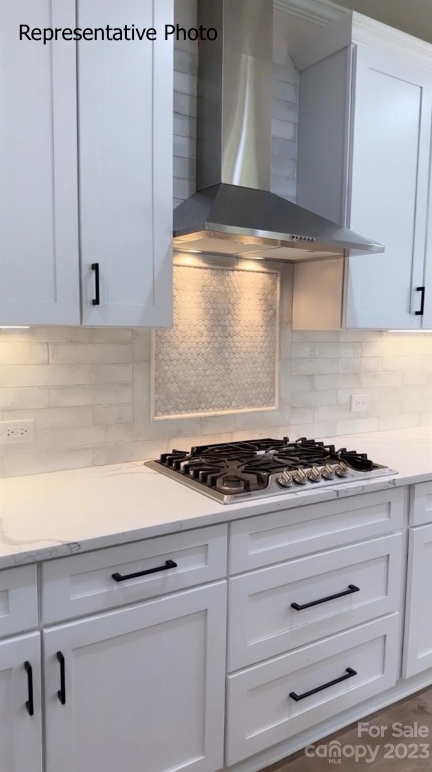 2432 Lakeview Circle Matthews, NC 28105 - Photo 11 of 20 a stove top oven sitting inside of a kitchen