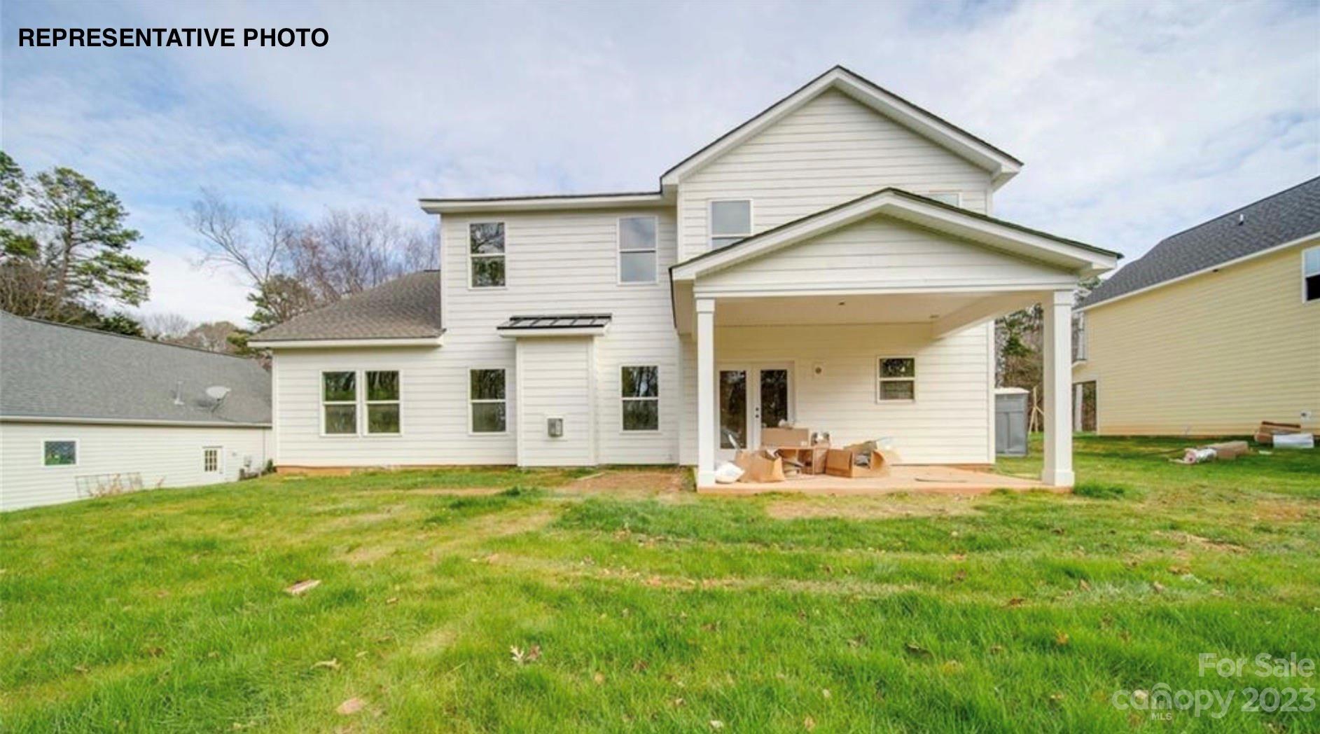 2432 Lakeview Circle Matthews, NC 28105 - Photo 6 of 20 a front view of a house with a yard