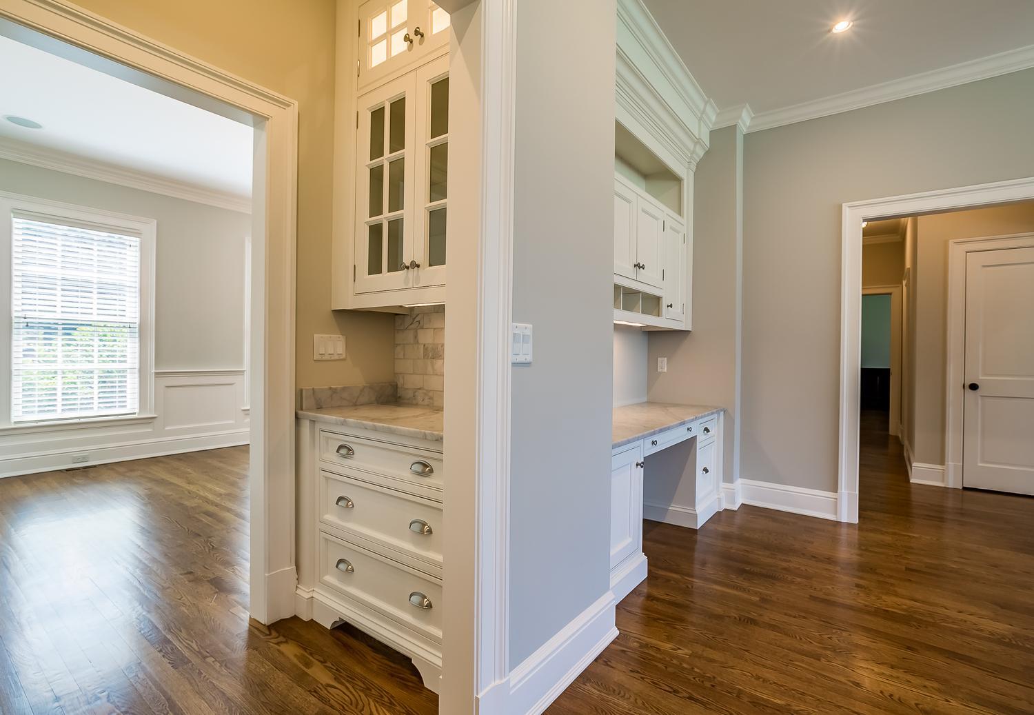 92 White Oak Shade Road New Canaan, CT 06840 - Photo 12 of 35 wooden floor with white cabinets and wooden floor