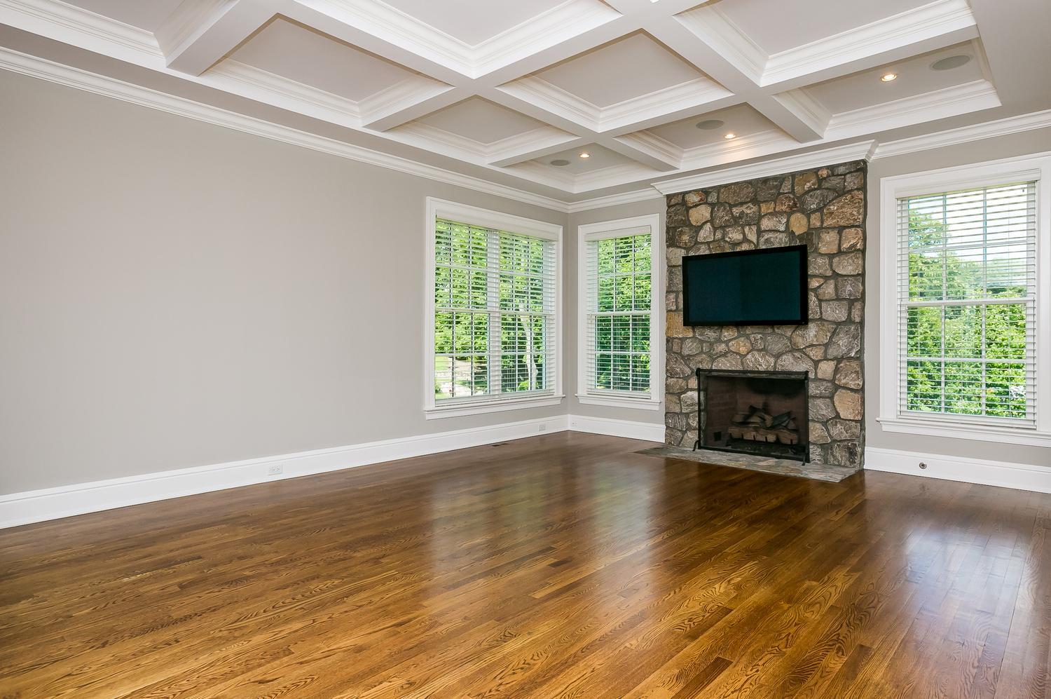92 White Oak Shade Road New Canaan, CT 06840 - Photo 14 of 35 a view of empty room with fireplace and wooden floor