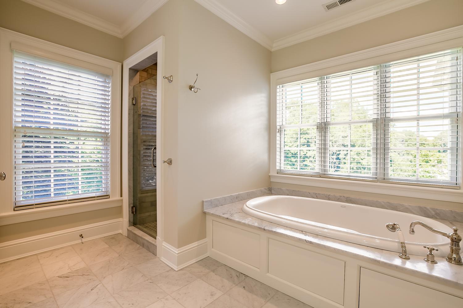 92 White Oak Shade Road New Canaan, CT 06840 - Photo 20 of 35 a white bath tub sitting next to a window