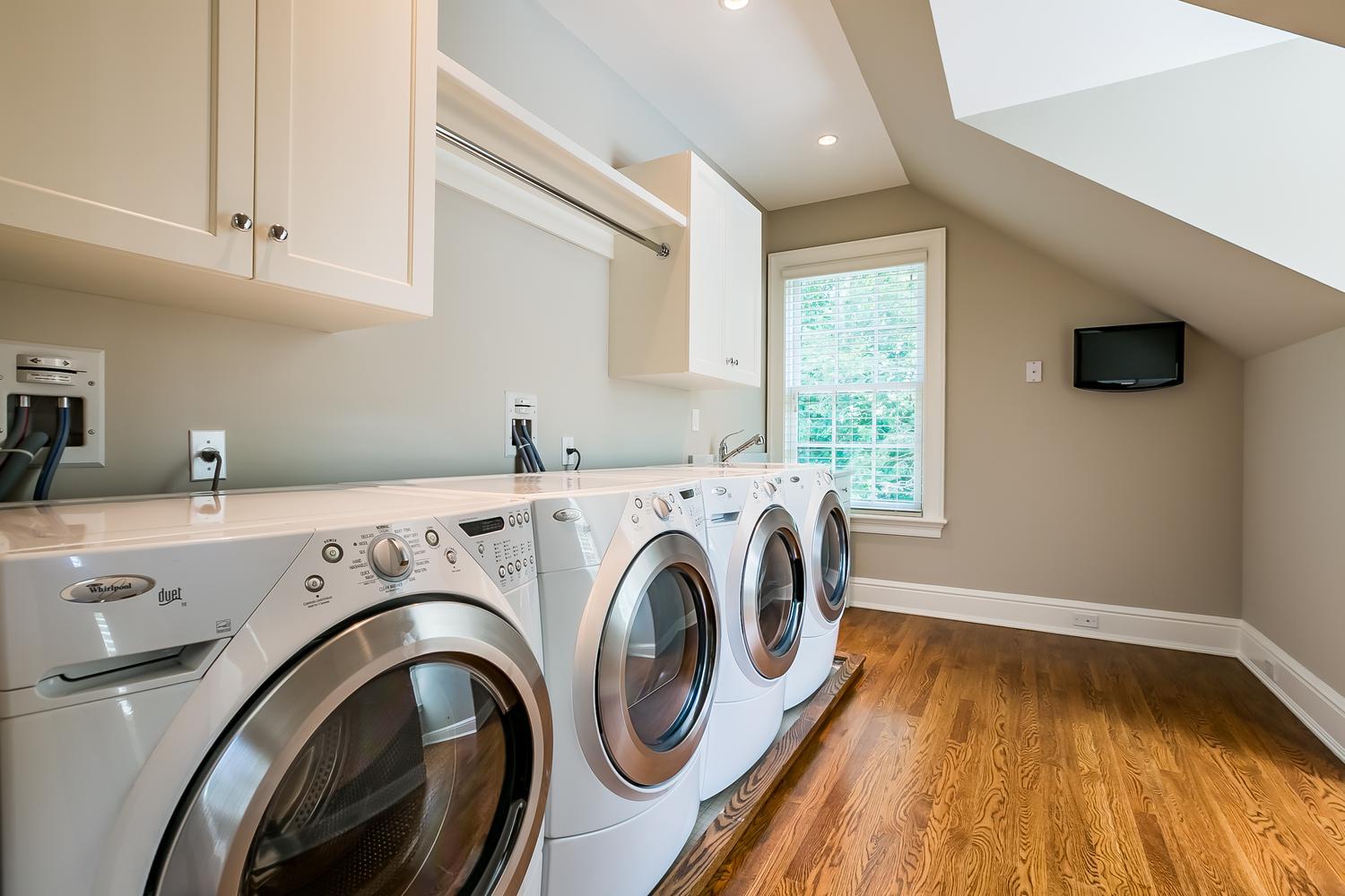 92 White Oak Shade Road New Canaan, CT 06840 - Photo 27 of 35 a utility room with dryer and washer
