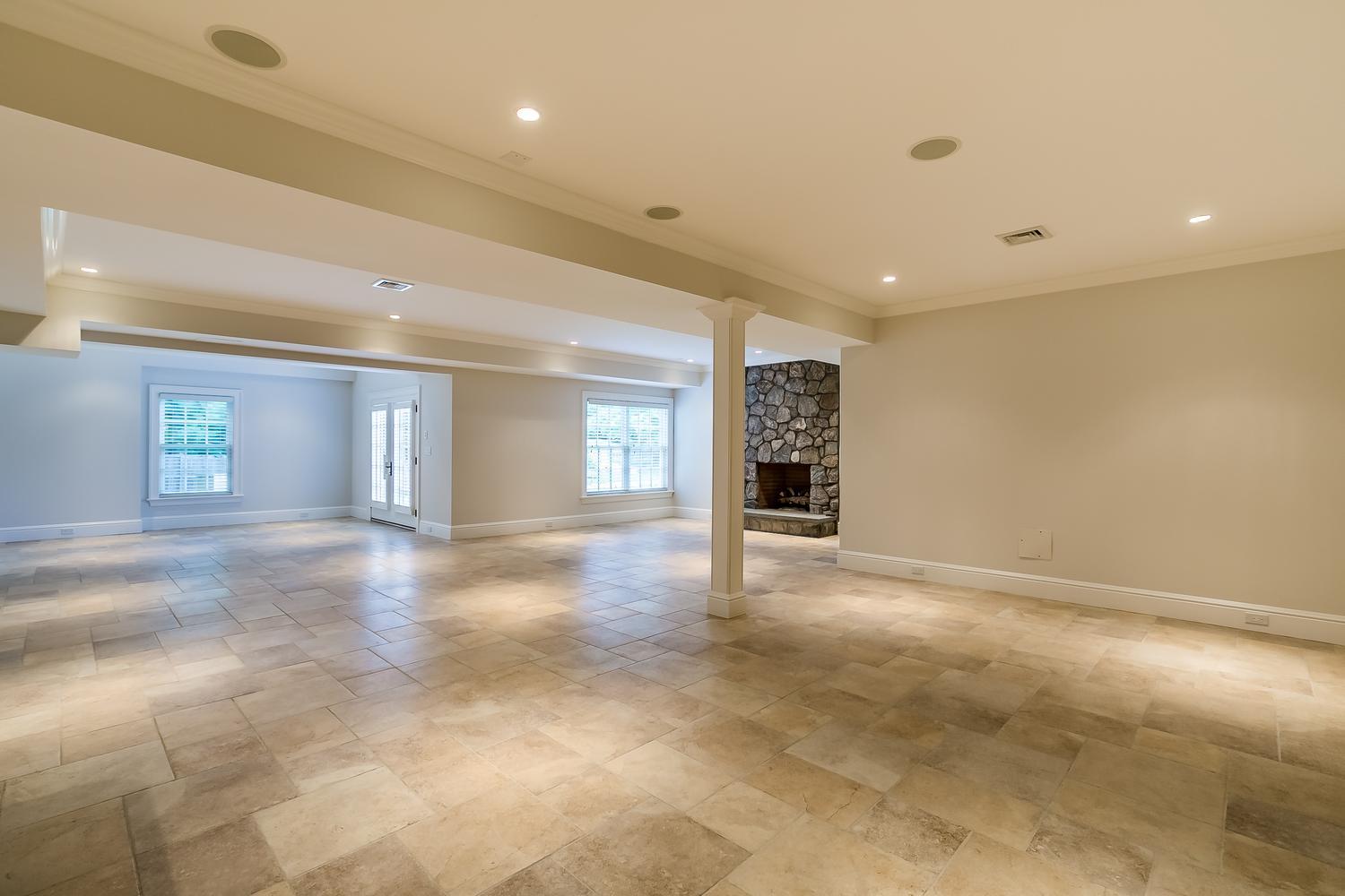 92 White Oak Shade Road New Canaan, CT 06840 - Photo 29 of 35 a view of a livingroom with a fireplace