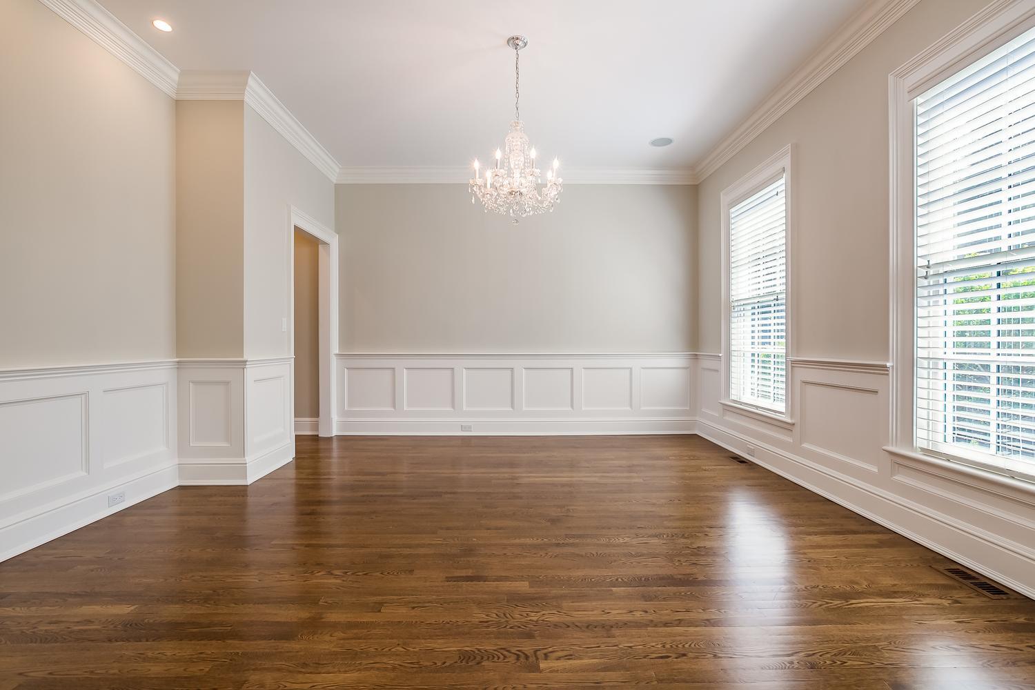 92 White Oak Shade Road New Canaan, CT 06840 - Photo 7 of 35 a view of an empty room with wooden floor and a window