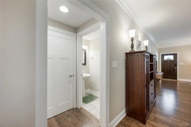 a bedroom with a large bed and a tv