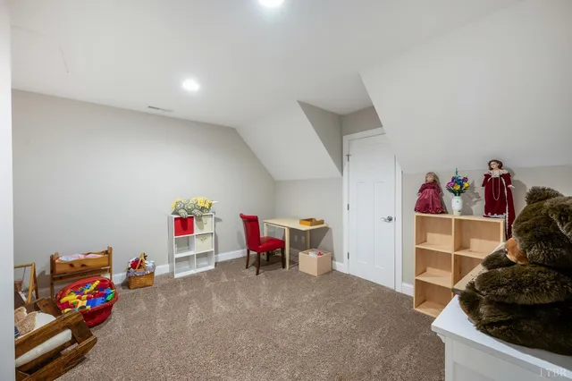 a bedroom with a bed and a closet