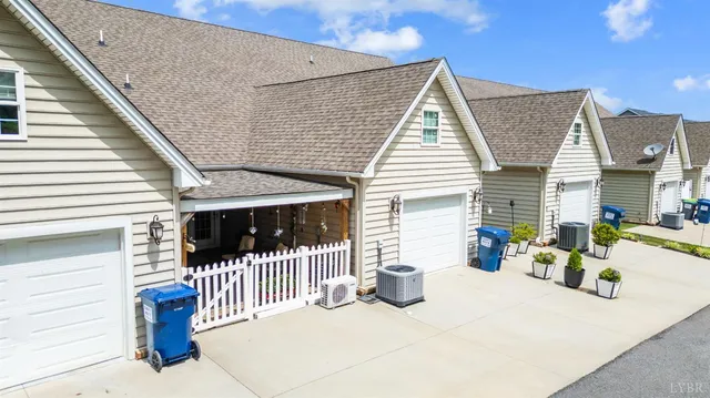 a balcony with furniture and wooden floor