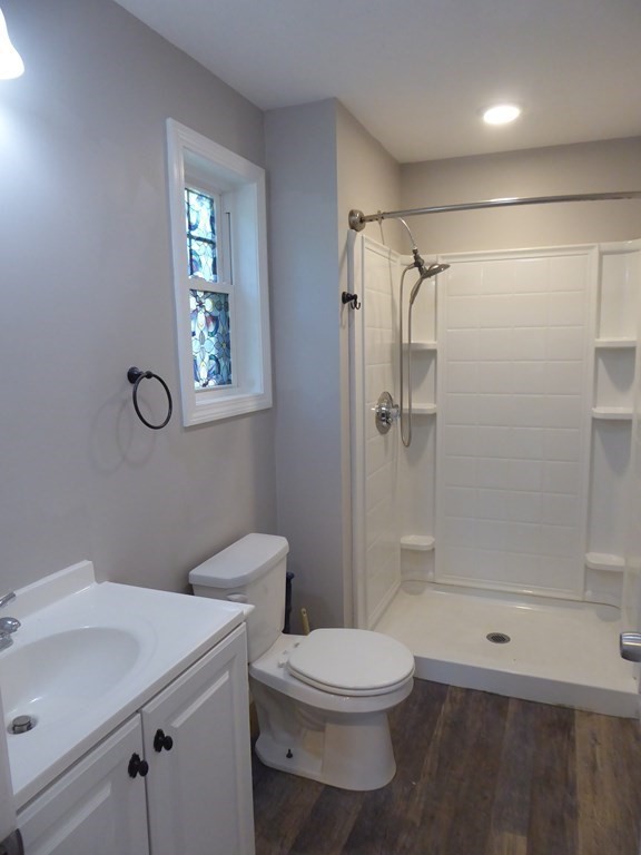 86 Pequot Point Road Westfield, MA 01085 - Photo 11 of 21 a bathroom with a toilet sink and shower