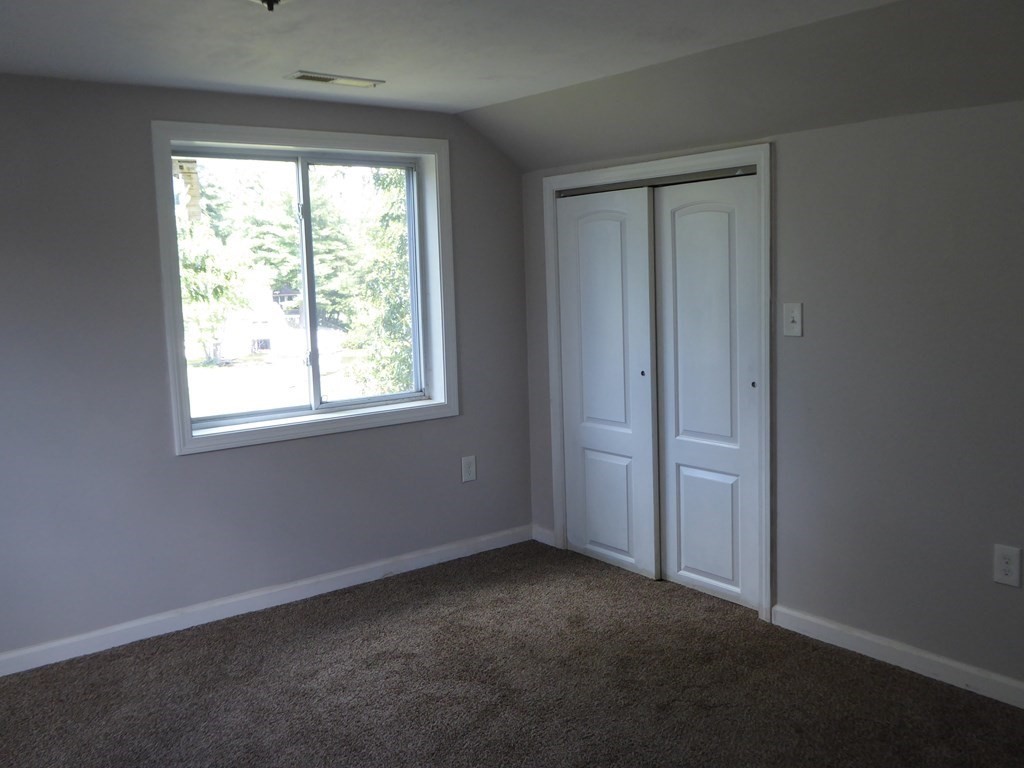 86 Pequot Point Road Westfield, MA 01085 - Photo 14 of 21 an empty room with windows