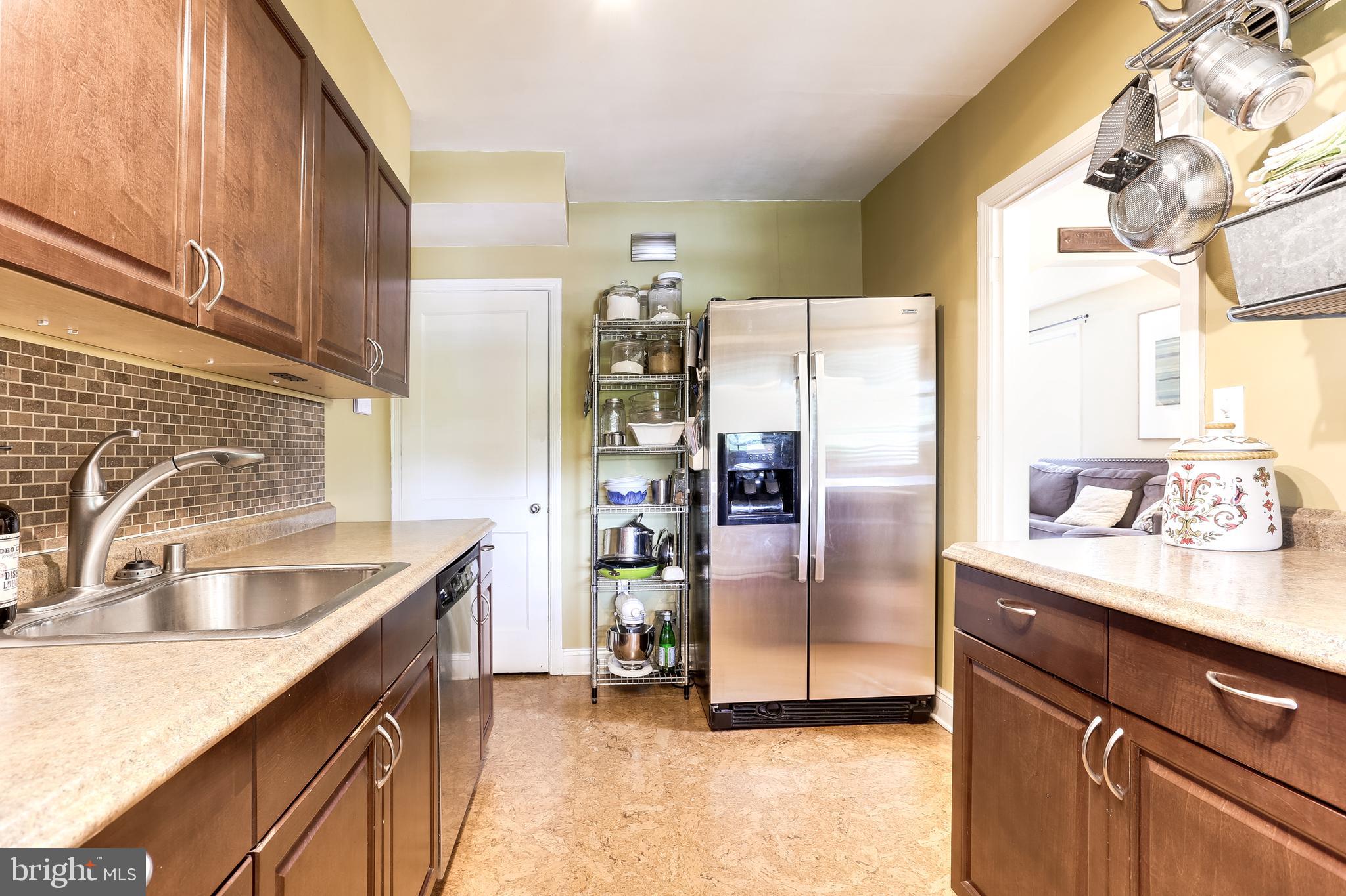173 Cherrydell Road Baltimore, MD 21228 - Photo 12 of 29 Updated Kitchen w/ Tile Backsplash
