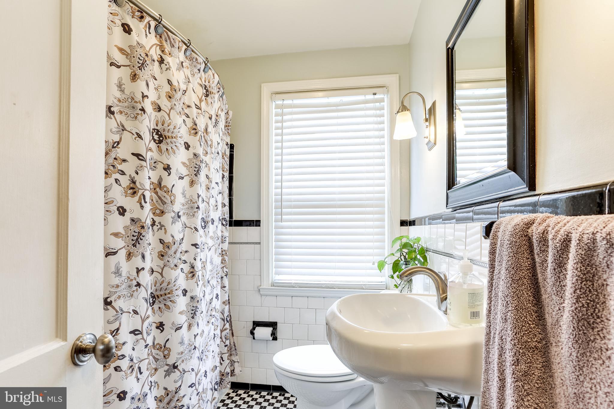 173 Cherrydell Road Baltimore, MD 21228 - Photo 21 of 29 Full Bath w/ Tub/Shower & Tile Floors