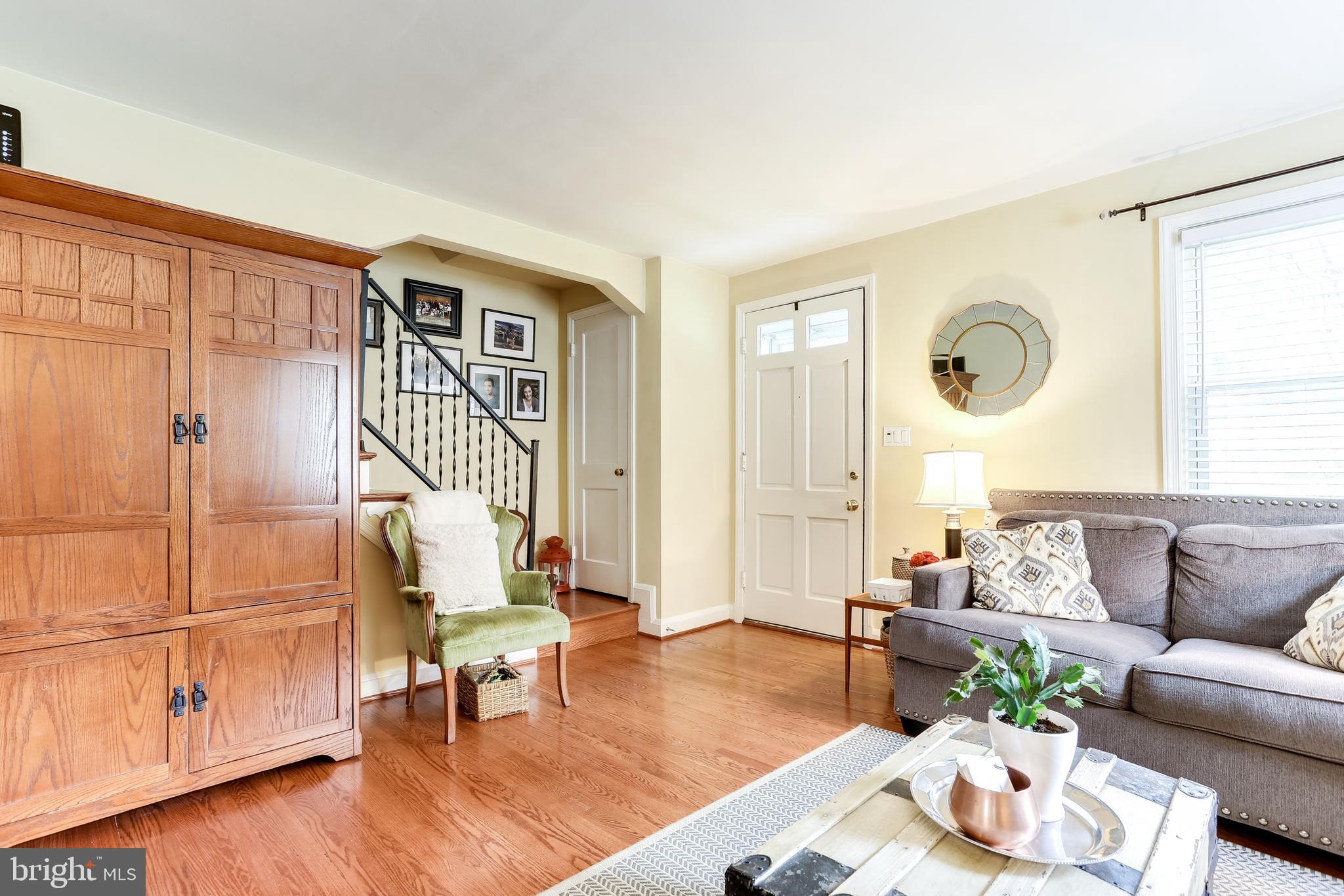 173 Cherrydell Road Baltimore, MD 21228 - Photo 4 of 29 Bright Living Room w/ Gleaming Hardwood Floors