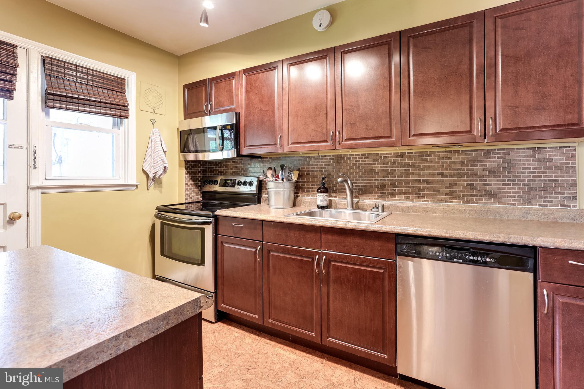 173 Cherrydell Road Baltimore, MD 21228 - Photo 10 of 29 Updated Kitchen w/ Stainless Steel Appliances