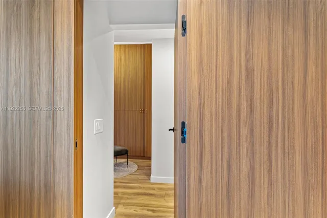 a view of a hallway with closet