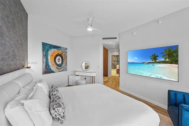 a bathroom with a double vanity sink mirror and shower