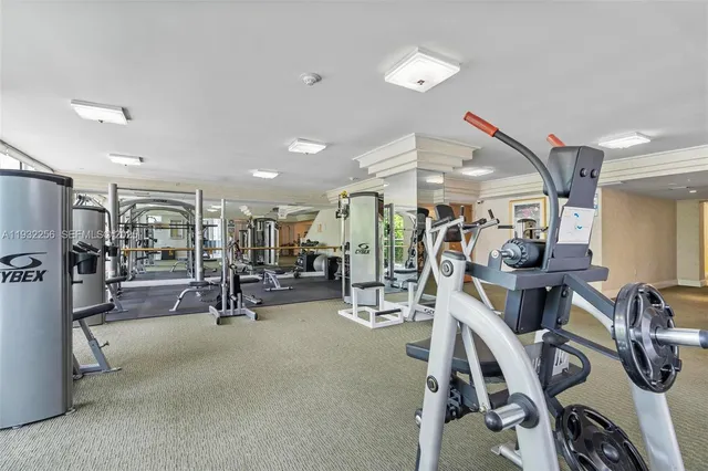 a view of a living room and kitchen